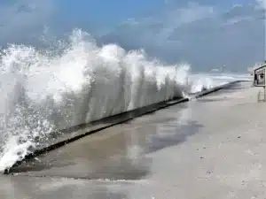 Sea hitting a seawall